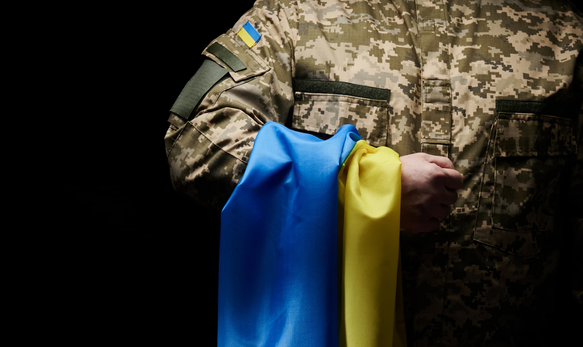 ukrainian-soldier-holds-a-flag-of-the-independent-2022-03-30-00-24-48-utc
