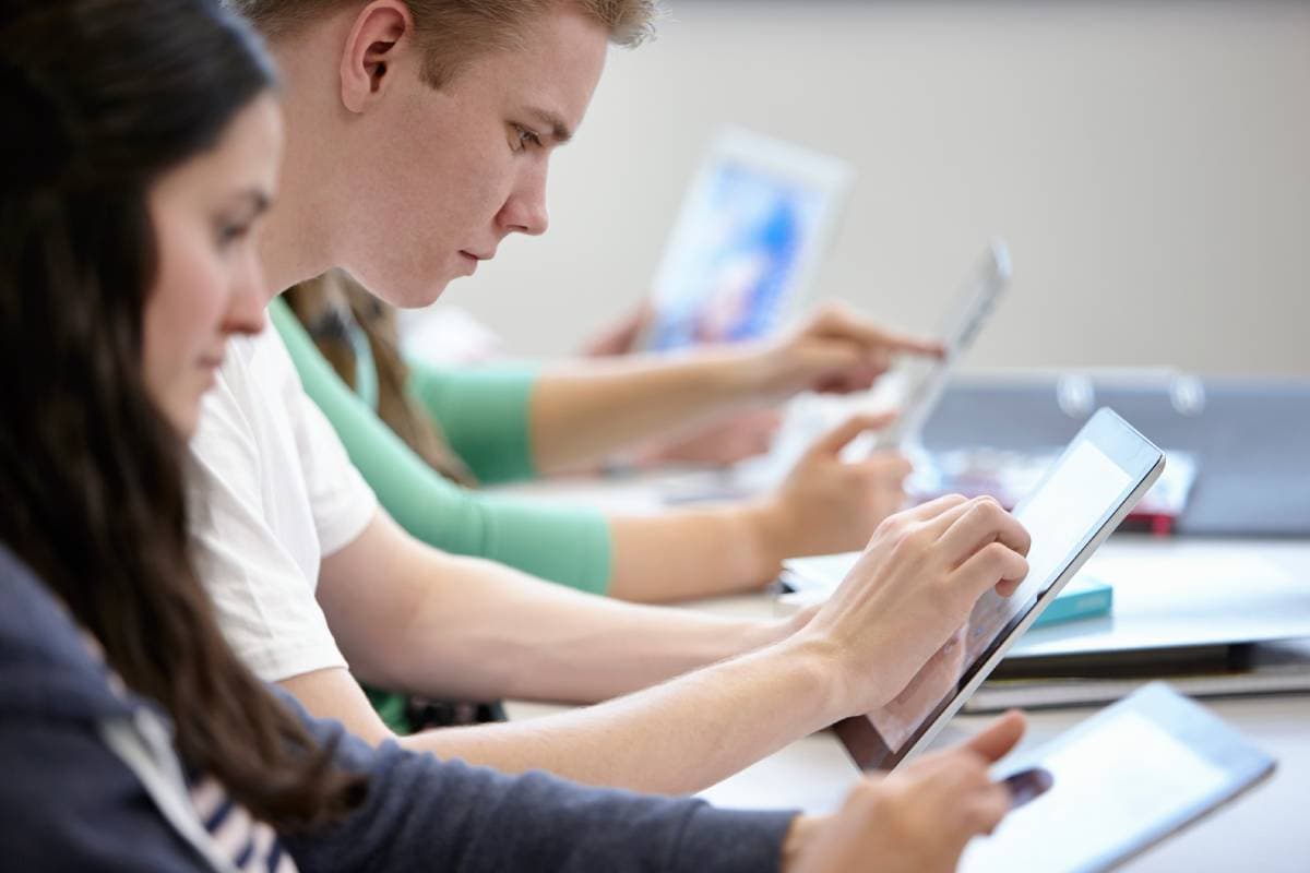 teenagers-using-digital-tablets-classroom-2023-11-27-04-54-37-utc (1) (1)