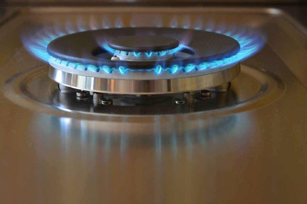 double-gas-ring-on-a-brand-new-gas-stove-burning-2023-11-27-04-50-32-utc (1) (1)