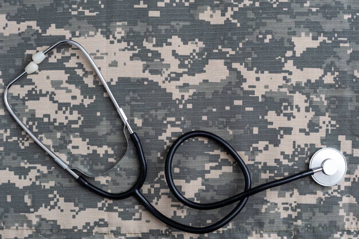 stethoscope-lies-on-the-uniform-of-a-us-soldier-t-2023-11-27-04-49-54-utc (1) (1)
