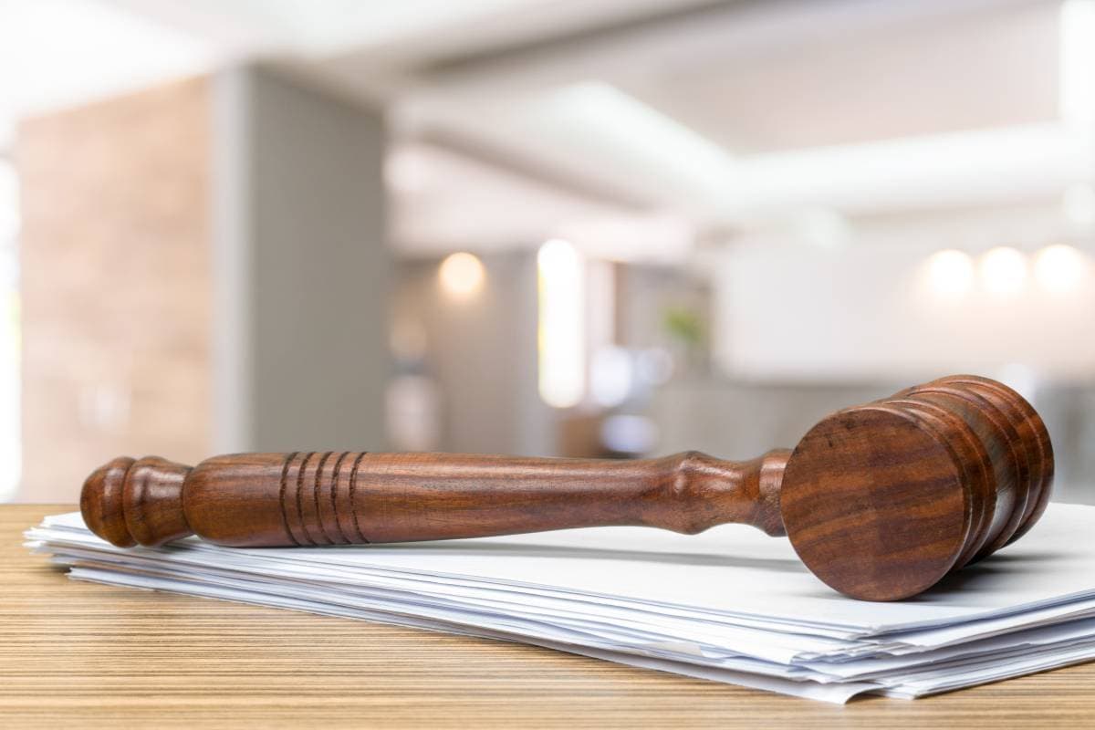 wooden-gavel-on-table-close-up-justice-concept-2023-11-27-04-57-49-utc (1) (1)